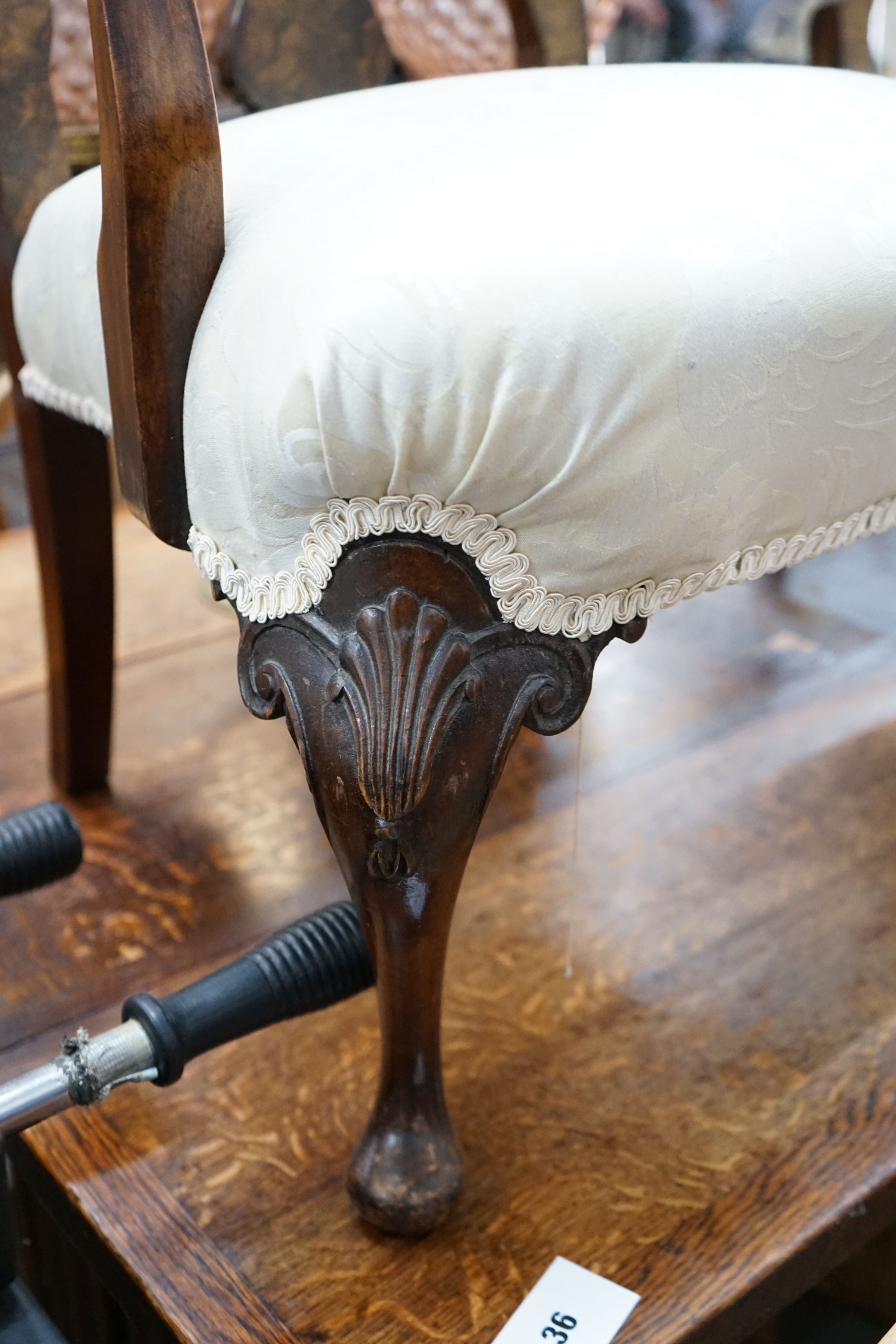 A pair of Queen Anne revival walnut child's elbow chairs, width 50cm, depth 42cm, height 79cm